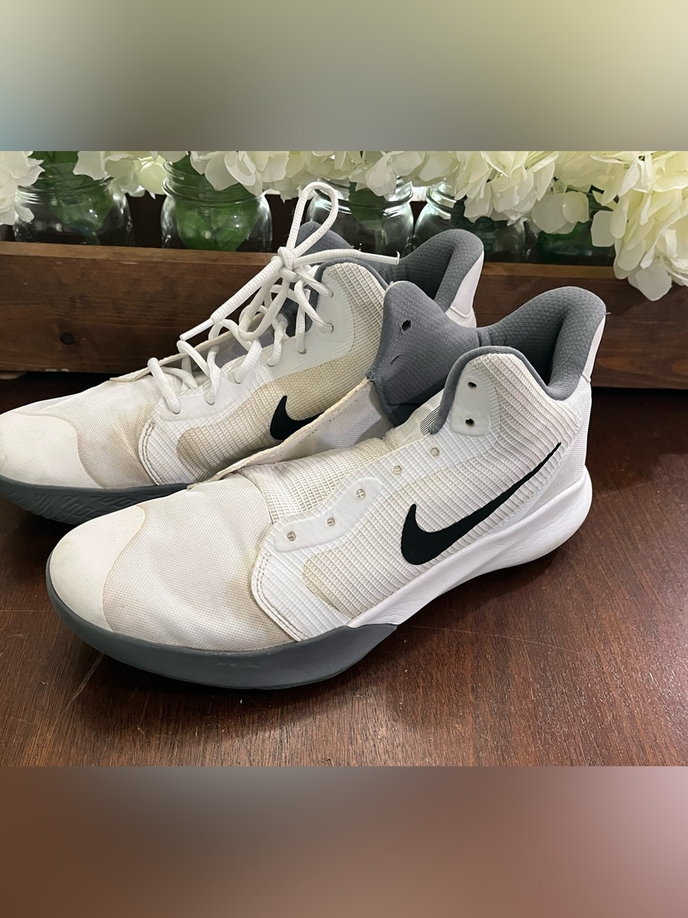 Nike White and Gray Low-Top Sneakers with Black Swoosh. Missing one lace!